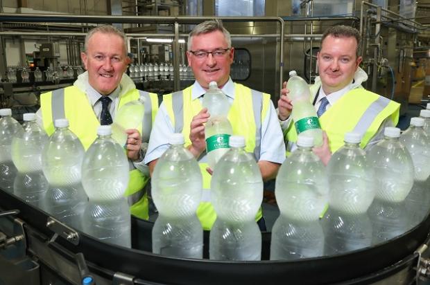 Economy Minister Conor Murphy is pictured with Liam Duffy, Chief Executive and owner of Classic Mineral Water, and Kieran Donoghue, CEO Invest Northern Ireland.