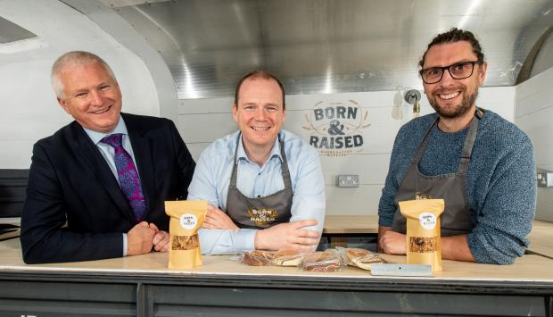 Pictured with Economy Minister Gordon Lyons (centre) at Born & Raised Waffles in Ahoghill are (left) Alan McKeown, Invest NI’s Chief Transformation Officer and Michael Henderson, owner of Born & Raised Waffles.