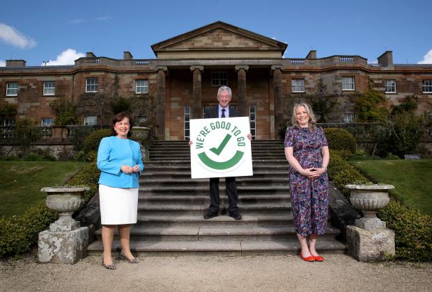 Minister Diane Dodds at Hillsborough Castle with Chief Executive of Tourism NI, John McGrillen, and Laura McCorry, Head of Hillsborough Castle.