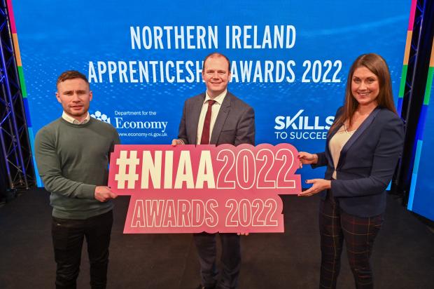 Minister Gordon Lyons at the virtual NI Apprenticeship Awards ceremony with ceremony compere Sarah Travers with former two-weight world champion boxer Carl Frampton.