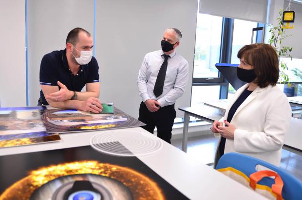 Economy Minister Diane Dodds chats with SRC student Borza Tomas (left) and Curriculum Area Manager Chris Hobson during a tour of Southern Regional College's new £15million Banbridge campus.